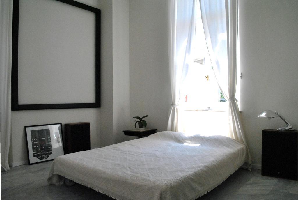 Alice Inn Atenas Quarto foto